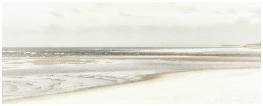 Photograph styled in High Key "watercolour" look of seascape, sand banks and sand dunes